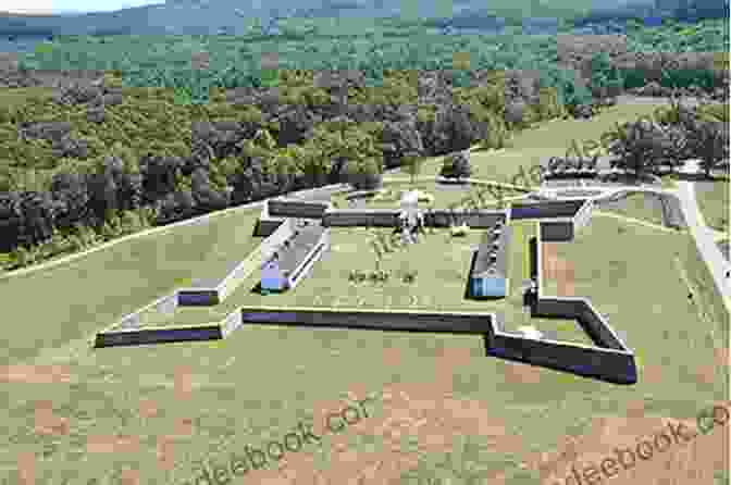 A Panoramic View Of Fort Frederick, A Dilapidated Fort Perched Atop A Hill, With Lush Greenery Surrounding It. The Box Of Secrets: A Tale Of Mystery And History From The American Revolution