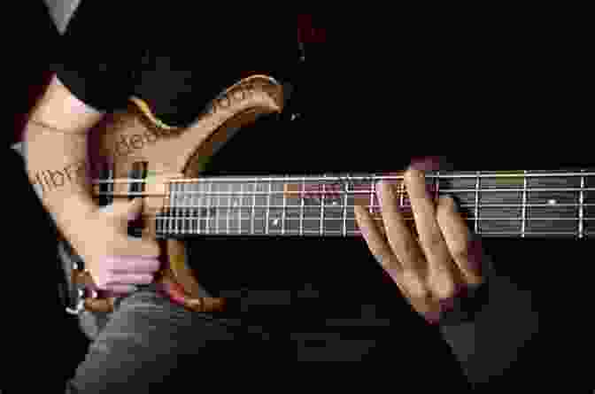 A Photograph Of A Bass Player Using Slap Bass Technique Reading Contemporary Electric Bass: Guitar Technique