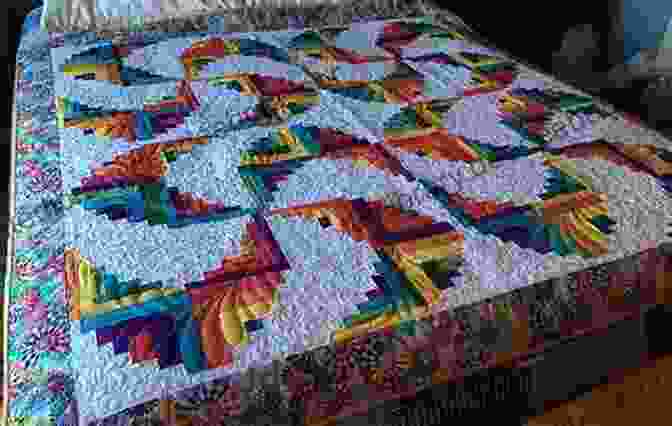 A Rainbow Quilt With A Log Cabin Pattern Modern Rainbow Patchwork Quilts: 14 Vibrant Rainbow Patchwork Quilt Projects Plus Handy Techniques Tips And Tricks (Crafts)