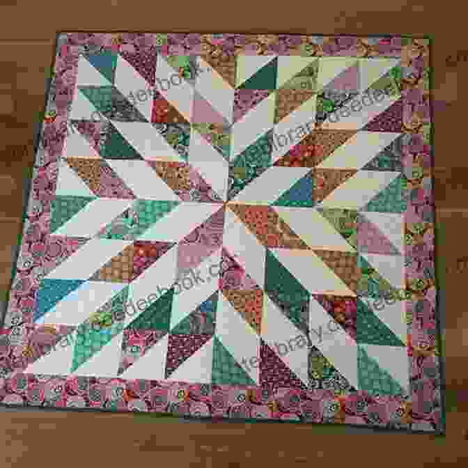 A Rainbow Quilt With A Starburst Pattern In The Center Modern Rainbow Patchwork Quilts: 14 Vibrant Rainbow Patchwork Quilt Projects Plus Handy Techniques Tips And Tricks (Crafts)