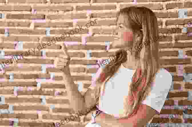 A Young Woman Standing In Front Of A Brick Wall, Smiling No More Sheets: Starting Over