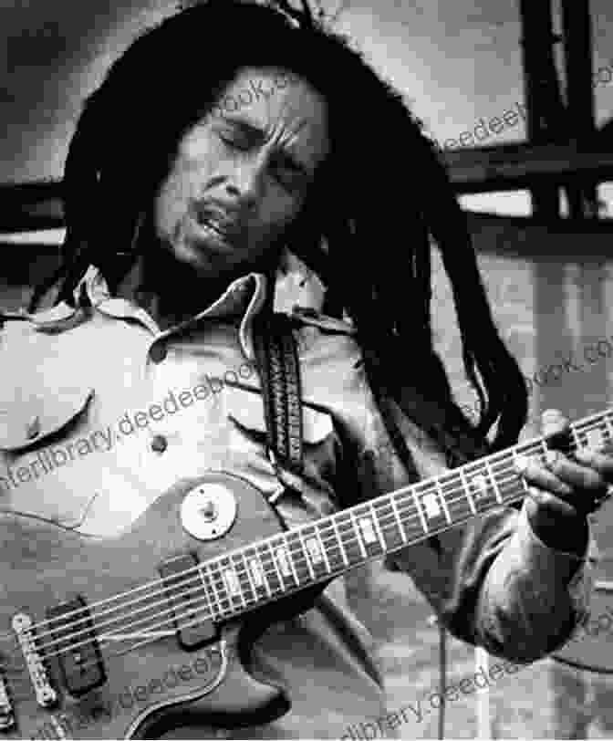 Bob Marley Playing The Guitar, With His Iconic Dreadlocks And A Peaceful Smile On His Face Bob Marley For Ukulele Bob Marley